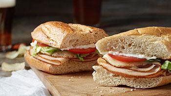 Turkey Sub · Loaded with turkey, Wisconsin cheese blend, lettuce, tomatoes and mayo.