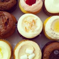 One Dozen Classic Assortment · One dozen cupcakes.