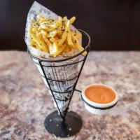 Truffle Oil Fries · Tossed with Parmesan cheese and chives. Served with chipotle aioli.