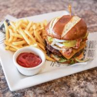 Burger · 1/2 lb. of Angus burger served with lettuce, tomatoes, onions, chipotle mayo, and fries. Add...