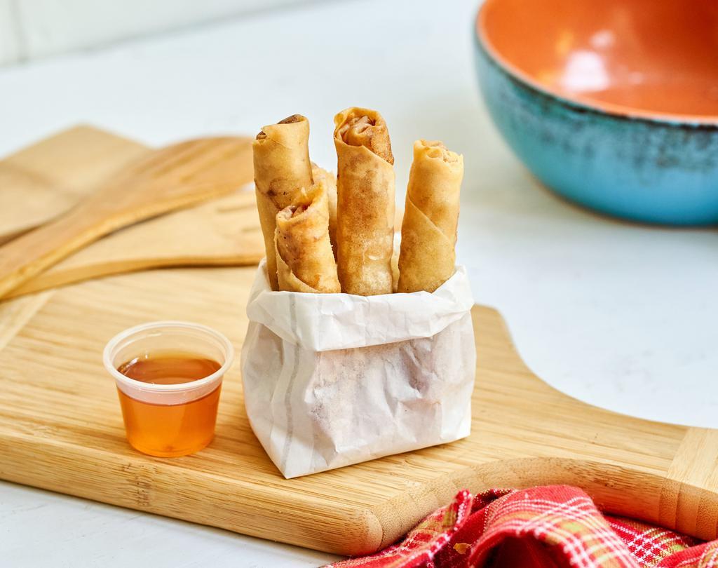 Spring Rolls · 5 pieces. Finger-sized spring rolls stuffed with cabbage, carrot, and glass noodle served with sweet plum sauce.