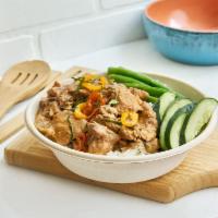 Panang Moo · Stewed pork Panang curry made with coconut milk, lime leaves, bell pepper served over rice w...