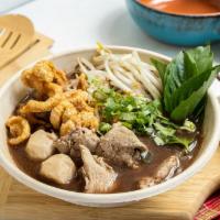 Boat Noodle Soup · Rice noodle, pork, bean sprout, basil, pork balls, Chicharrons in spicy pork broth, topped w...