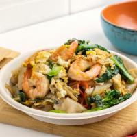 Drunken Noodle · Stir fried flat rice noodle with scramble egg, Chinese broccoli, basil, spicy chili, garlic,...