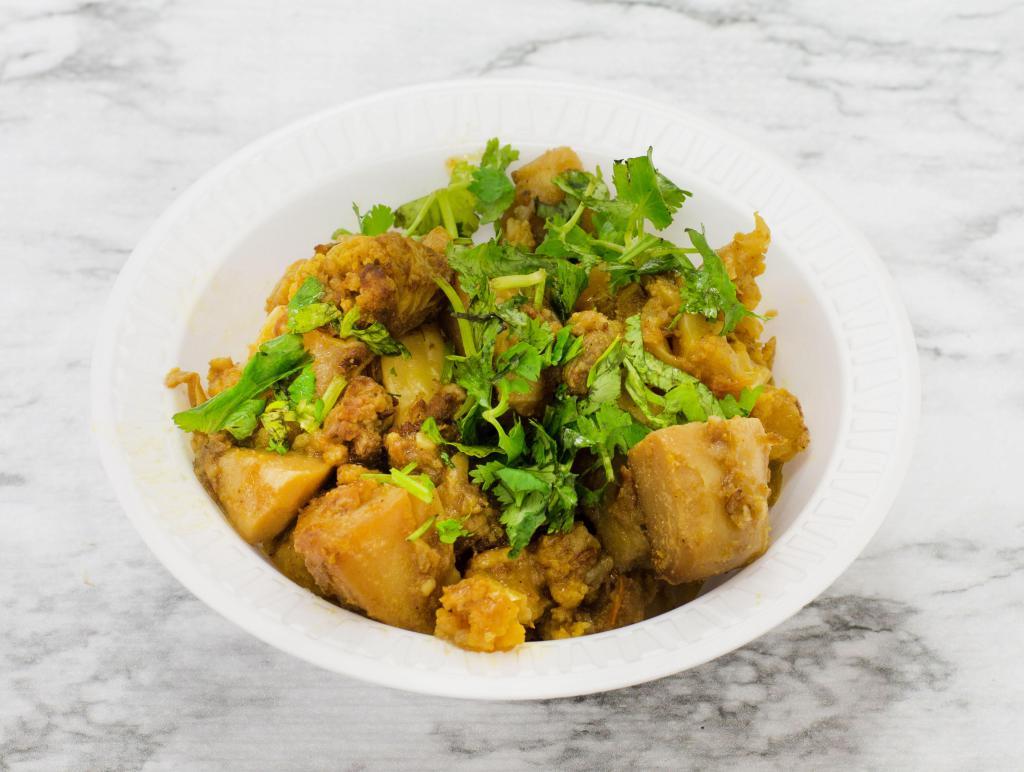 Aloo Gobi · Stir fried potatoes and cauliflower cooked with ginger and garlic.