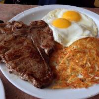 T-Bone Steak & Eggs Combo · A tender 12 oz. seasoned steak accompanied by 2 fried eggs, and hash-browns, served with tor...