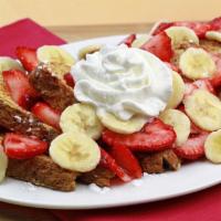 French Toast · 6 slices of fabulous french toast. Served with powdered sugar and whipped cream. Add bananas...