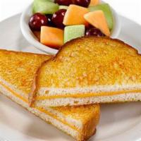 Kids Grilled Cheese Sandwich · Grilled American cheese sandwich served on white bread, served with french fried or fresh se...