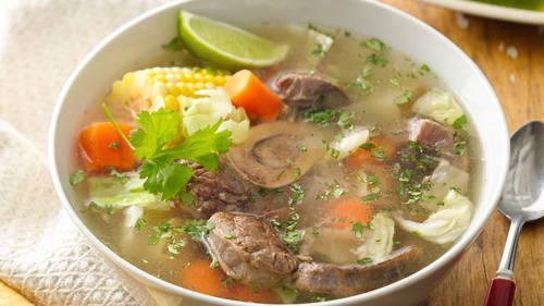 Caldo De Res · Served with rice and molcajete sauce and corn tortillas.