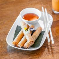 Crispy Rolls · Crispy and tender vegetarian appetizer served with sweet and sour sauce.