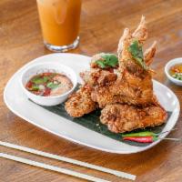 Pure Wings · Deep-fried Thai country chicken wings with Jaew sauce. It’s just amazing!