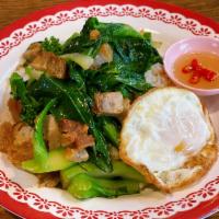 Kana Moo Krob · Stir-fried Thai crispy pork belly and Chinese broccoli served over jasmin rice.