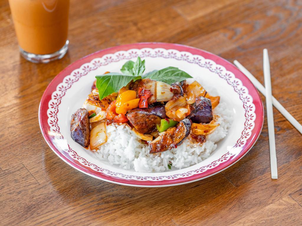 Pad Eggplant  · Eggplant stir-fried with your choice of meat, Thai chili paste bell pepper, onion, and scents with lots of Thai basil served over jasmin rice.