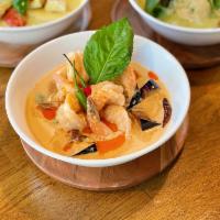 Red Curry  · A delightful balance of sweet and spicy flavors of the red curry paste with creamy coconut m...