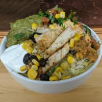 Mexican Rice Bowl · Grilled chicken over cilantro rice, black beans, corn, guacamole, sour cream, salsa verde, r...