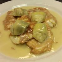 Chicken Francese with Artichoke Hearts · Battered chicken scaloppine simmered in a velvety white wine lemon butter sauce with articho...