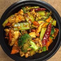 1009. Hunan Chicken · Sliced chicken sauteed with broccoli and other vegetables in a spicy hot sauce. Hot and spicy.