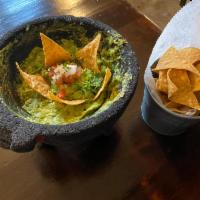 Guacamole · Home-made guacamole served with corn tortilla chips.