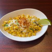 Esquites del Barrio · Corn kernels, mayonnaise, epazote, lime juice, Mexican cotija cheese topped with powdered ch...