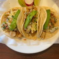 3 Pescado Tacos · Grilled fish tacos, topped with pico de gallo and sliced avocado.
(taco orders can not be mi...
