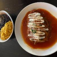 Chile Relleno · Roasted Poblano pepper battered with flour and egg, filled with Mozarella cheese in mild tom...