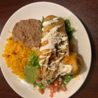 Chimichanga · Fried flour tortilla with cheese and your choice of beef, chicken or chorizo served with ric...