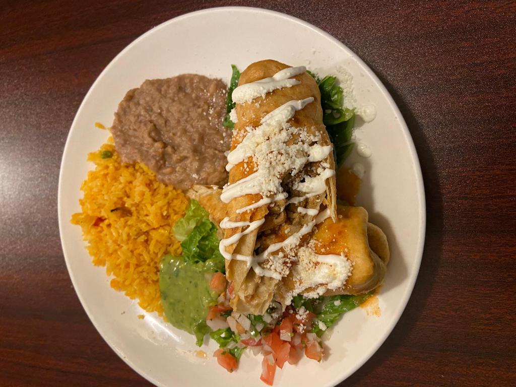 Chimichanga · Fried flour tortilla with cheese and your choice of beef, chicken or chorizo served with rice, beans and pico de gallo.