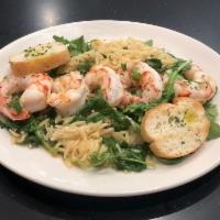 Shrimp Scampi · White wine, lemon & butter sauce, served on a bed of orzo and arugula.