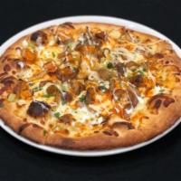 Buffalo Chicken Pizza · Grilled Chicken, Buffalo Sauce, Fresh Mozzarella, Caramelized
Onions, Diced Celery with a Ra...