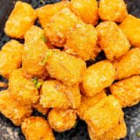 Tater Tots (Regular) · Double fried crispy tots, All The Way option: topped with togarashi powder, bonito flakes, y...