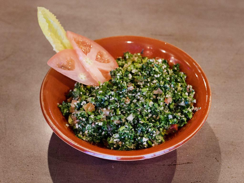 Taboulah · Authentic parsley salad with bulgur, mixed with chopped scallion, tomato, mint and olive oil. Spicy.