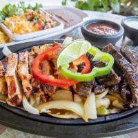 Combo Fajitas for 1 · A combination of select top-grade skirt steak, and grilled chicken breast served with your c...