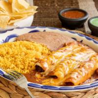 Cheese Enchilada Dinner · 3 enchiladas stuffed with cheese topped with your choice of sauce, and grated cheese. Served...