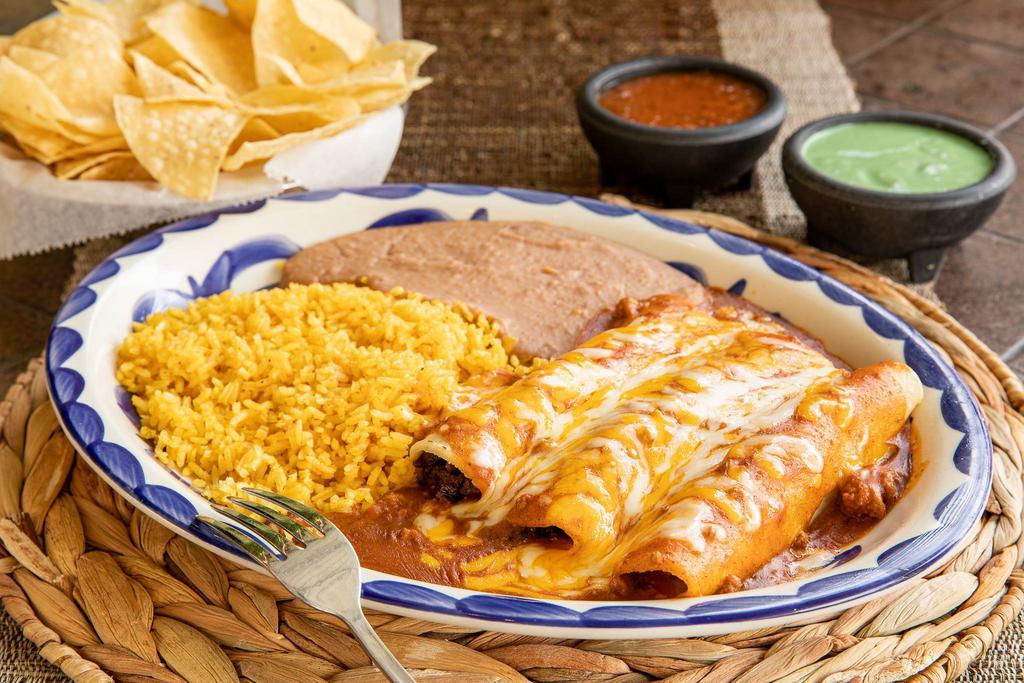 Cheese Enchilada Dinner · 3 enchiladas stuffed with cheese topped with your choice of sauce, and grated cheese. Served with refried beans, and Mexican rice.