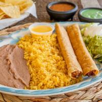Chicken Flautas · 2 tortillas filled with shredded chicken then rolled and deep-fried. Served with guacamole, ...