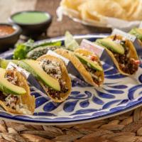 Mini Tacos · 5 pieces mini corn tortillas stuffed with your choice of meat topped with pico, avocado, and...
