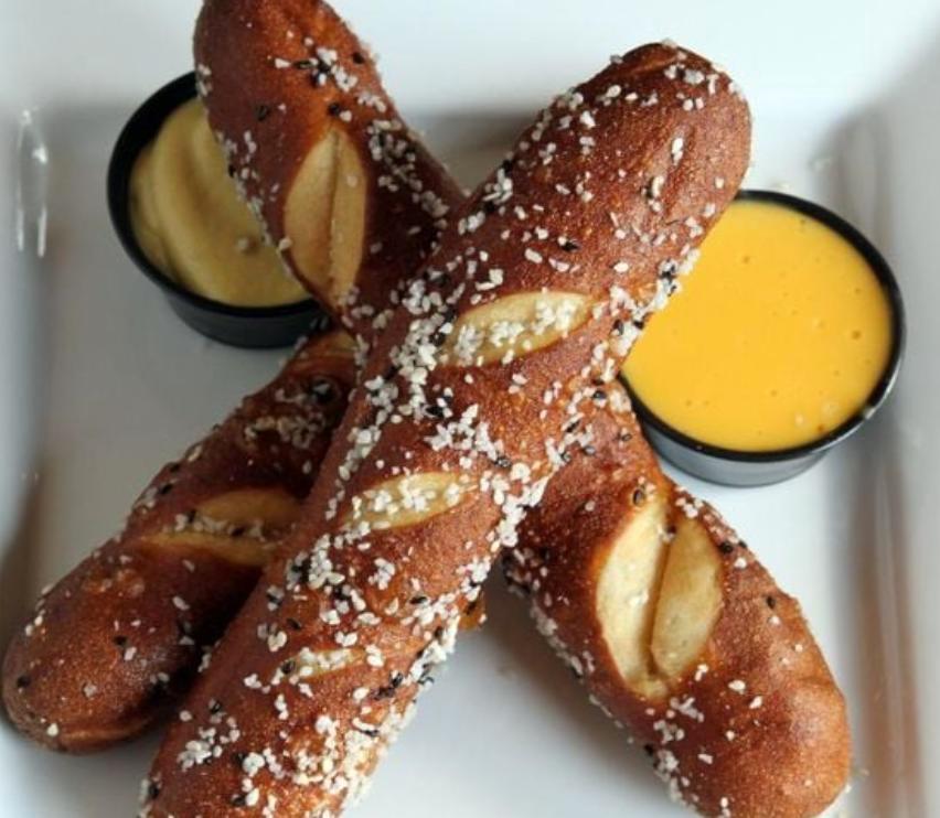 Bavarian Pretzels · 3 served with Gulden's mustard, gourmet mustard and cheese dipping sauce.