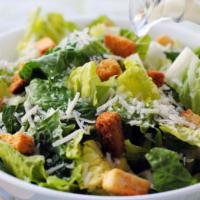 Chicken Caesar Salad · Romaine lettuce with grilled chicken, croutons, Parmesan cheese and side of Caesar dressing.