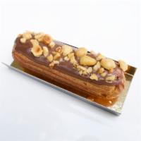 Eclair - Nutella · Nutella pastry cream and glaze, topped with hazelnuts.