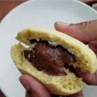 Nutella Stuffed Cookie · This buttery shortbread cookie baked with a Nutella center.