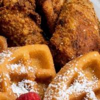Wing and Waffle · Six of our RIDCULOUS jumbo wings served with our homemade waffles, topped with powdered suga...