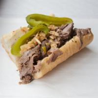 Italian Beef Sandwich · Classic Italian beef sandwich, dipped in aus jus, and served on French Bread.