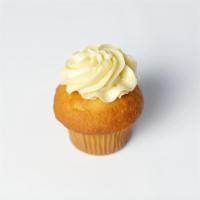 Passionfruit Cupcake · Yellow cupcake topped with a tart and sweet passionfruit buttercream