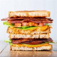 BLT · Mountains of bacon, crispy lettuce, tomatoes, and TRUFF™ spicy mayo! a classic!
