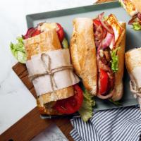 Sandwich Lollapalooza  · Can't decide? have one of each of our delicious sandwiches! 10 petite baguettes, one cubano,...