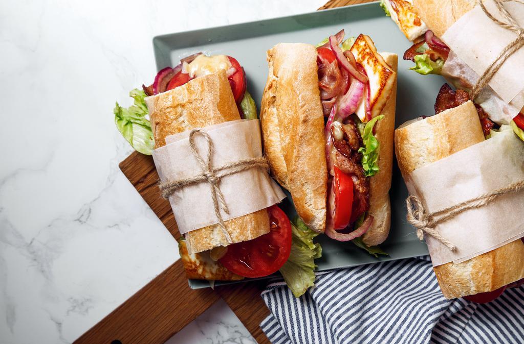 Sandwich Lollapalooza  · Can't decide? have one of each of our delicious sandwiches! 10 petite baguettes, one cubano, one leti's avocado toast, and one double decker grilled cheese ready for you!