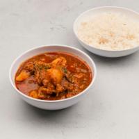Chicken Vinadaloo · Chicken cooked with potato in spicy tangy garlic sauce.