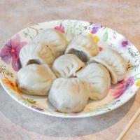 9. Steamed Dumpling · 8 pieces.