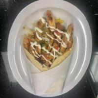Chicken Burrito Wrap · Our delicious big Flour Wrap, Grilled Chicken, Tomatoes, Lettuce, Sour Cream, Pink Sauce & M...
