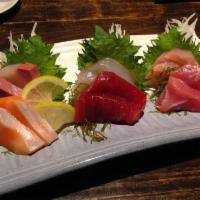 Triple Color Sashimi · 6 Pcs of Tuna, 6 Pcs of Salmon. 6 Pcs of Yellowtail, with rice only
